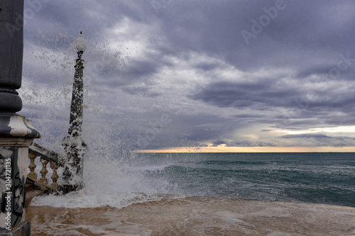 heavy waves during sunset 