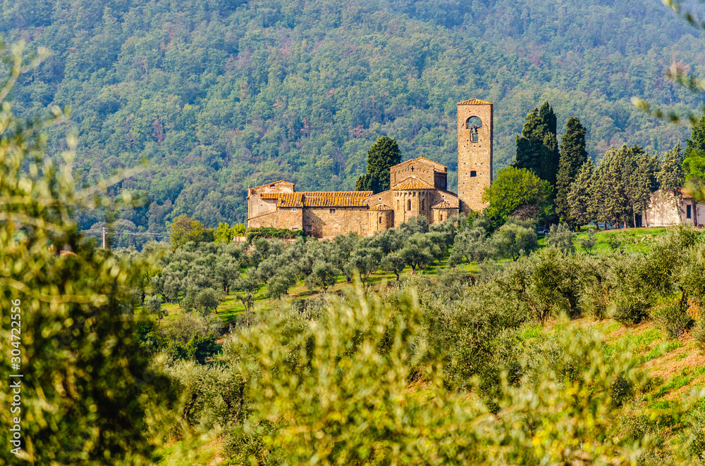 View of Ss. Mary and Leonard parsih church in Artimino with typical tuscan landscape