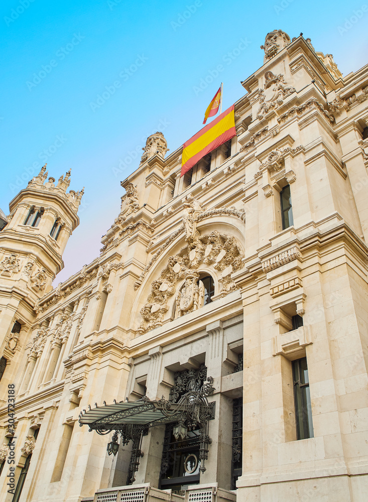 The main facade of the City Council of Madrid, Communications Palace, located at Cibeles Square. Madrid, Spain.