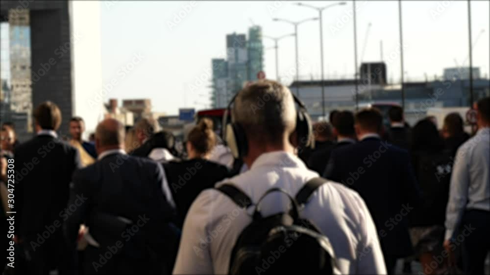 Group of business commuters walking towards station in sunset 4k diverse London population 