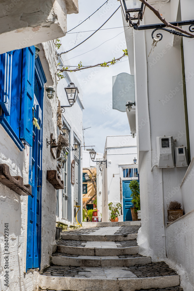 Fototapeta premium Traditional alley in ano Syros at Syros island, Cyclades, Greece