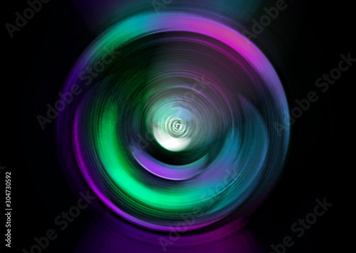 Abstract yellow background of colorful spin radial motion blur.