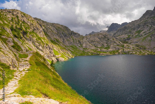 French Alps at an altitude of 2800 meters, Mountain peaks and untouched nature, clear lakes © nikolas