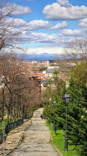 Beautiful panoramic view of the spring Madrid with snow tops of the Guadarrama Mountains 