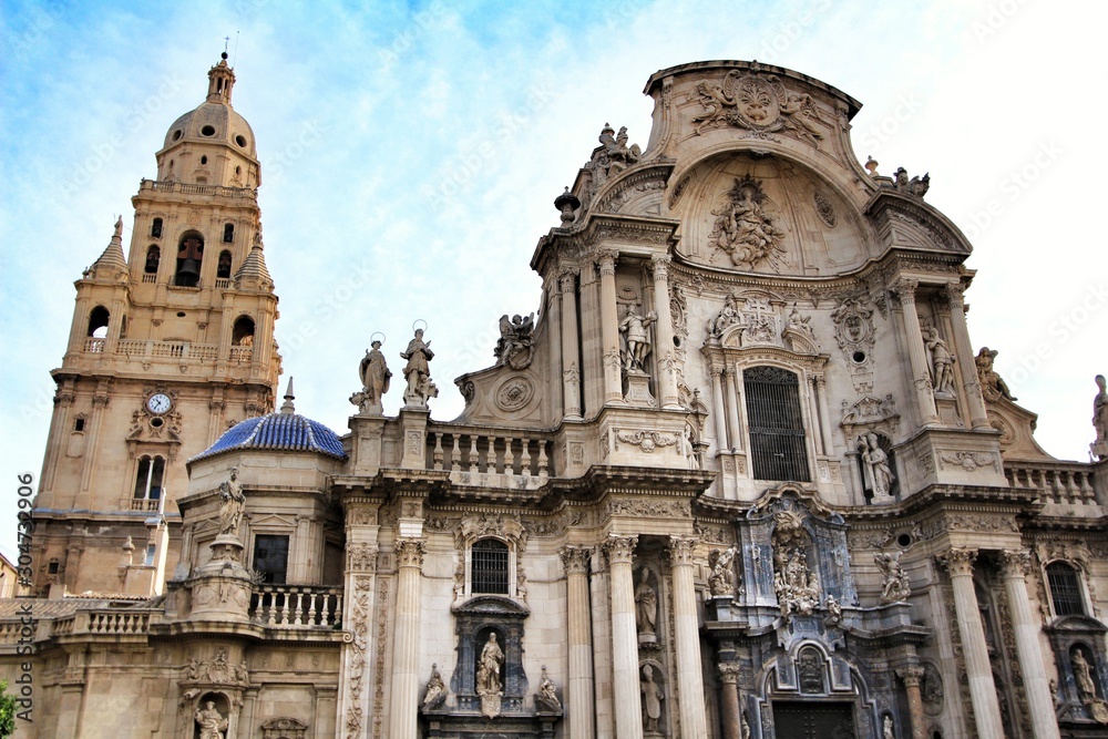 Tower bell, sculptures and carved stone details of the Cathedral of Murcia
