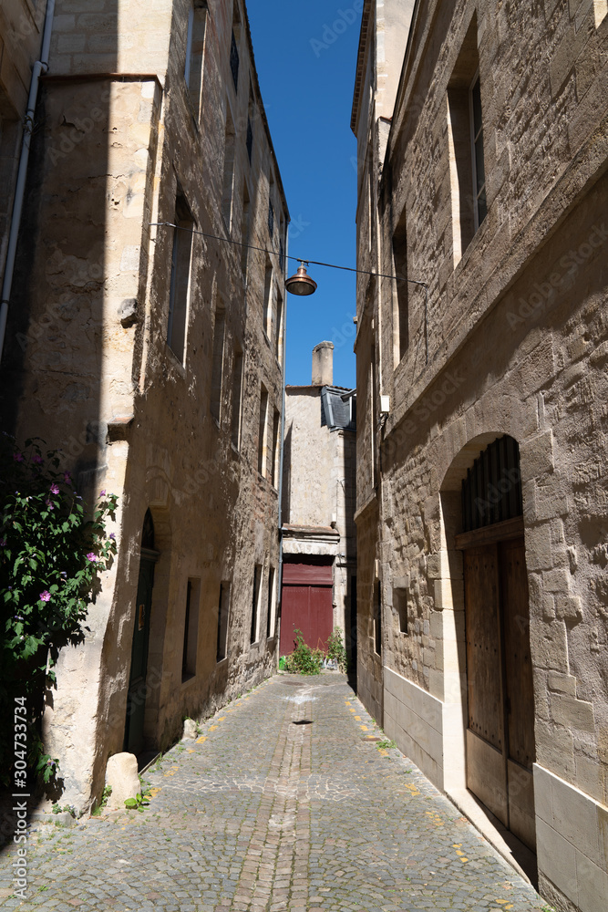 Pedestrian Street alley in old City center Bordeaux France