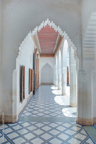 Ornamented Muqarnas pointed arches connecting the hallways of the palace, architecture intended to capture the fabulous Islamic and Moroccan style, Bahia Palace, Marrakesh, Morocco 
