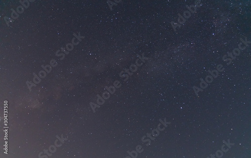 The sky and star in the mid night time.Night landscape and milky way.Universe and space background. © arcyto