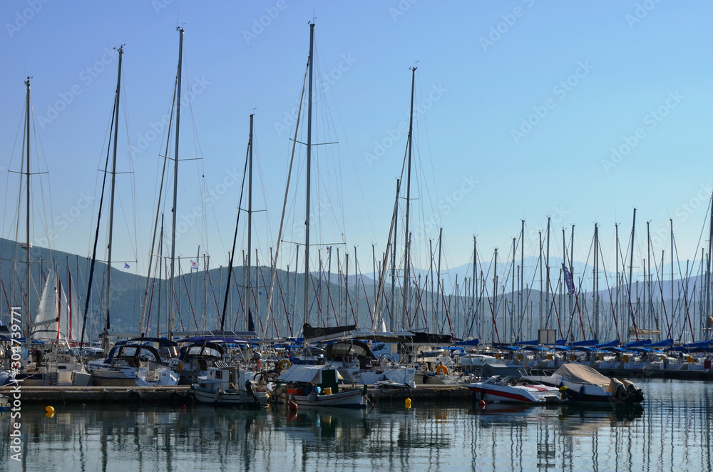Lefkada, Lefkada Island, Greece. 10/22/2019. white yachts, ships and boats on the water in the Ionian Sea in the port on the pier