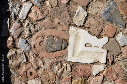 Athens, Greece, 10.27.2019. old brick,  ancient mosaic on the stairs to Philopappu Hill, or Muses Hill photo
