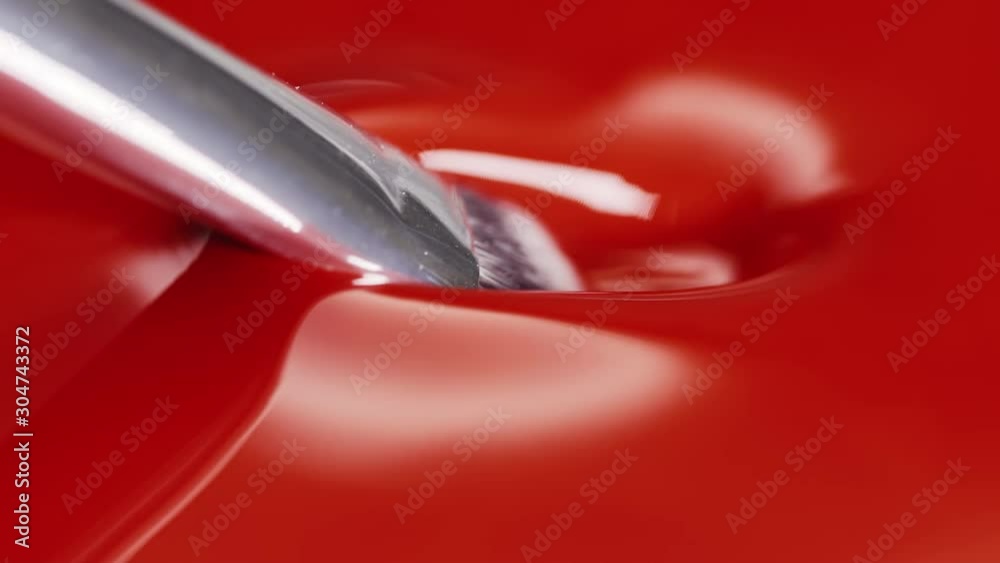 Red paint lipstick liquid texture, brush, oil paint for painting, mixing shades, art make up cosmetic for face. Red paint lipstick liquid texture, brush, oil paint for painting, mixing shades, art make up cosmetic for face.