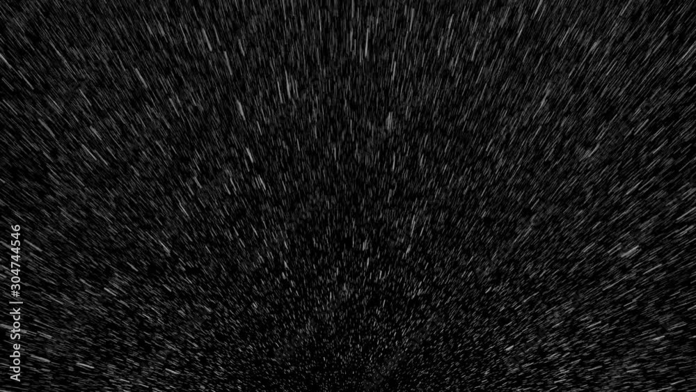 Heavy rain droplets fall down from camera