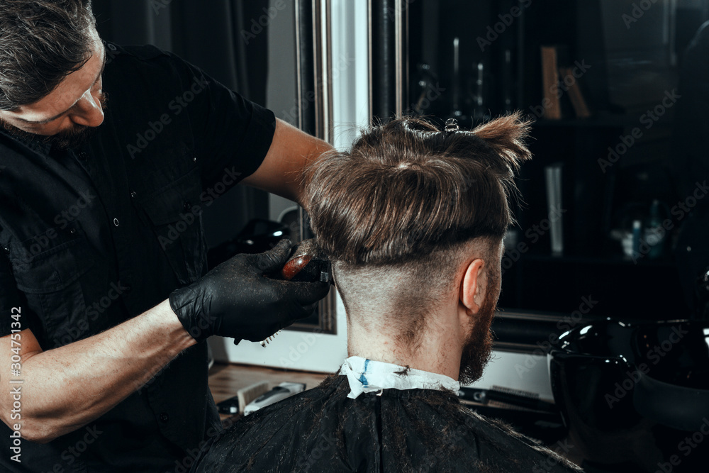 YOUNG HANDSOME MAN IN BARBERSHOP YOUNG HANDSOME MAN IN BARBERSHOP
