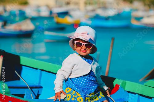 cute little baby girl travelling in Malta, Europe