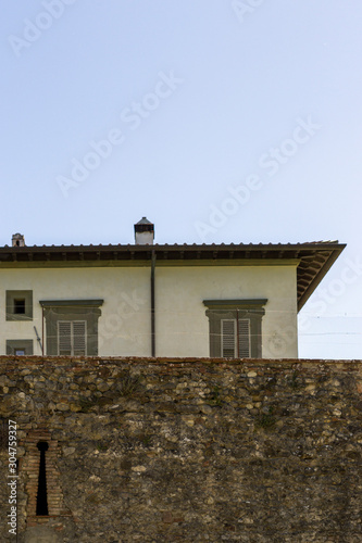 House and wall in Italy
