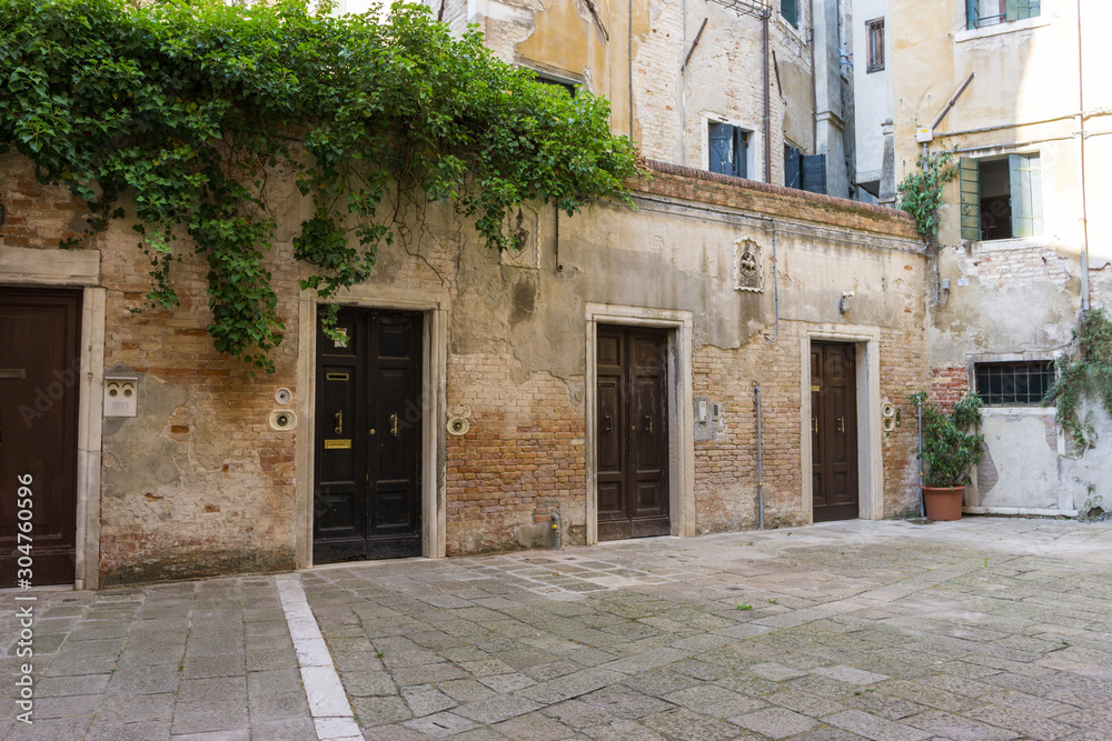 Row of front doors in Venice, Italy