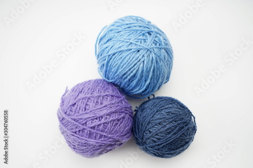 Wool skeins for knitting isolated on a light background. Home needlework