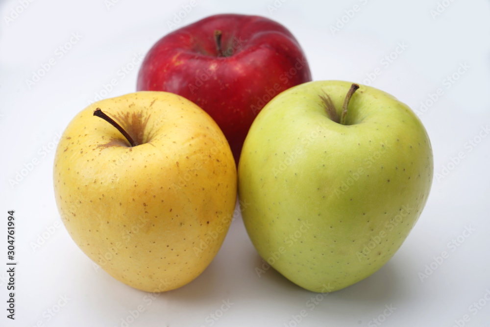 Colorful apples isolated on a light background Colorful apples isolated on a light background