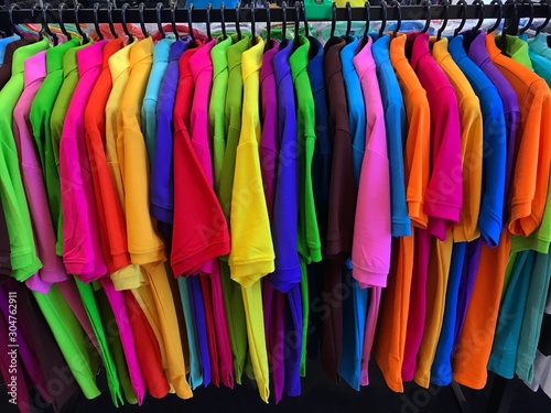 Many colors of clothes that hang in order to look beautiful and orderly.