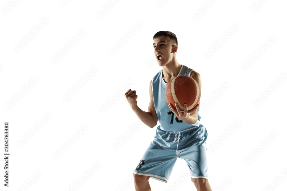 Full length portrait of young basketball player with a ball isolated on white studio background. Teenager celebrating winning. Concept of sport, movement, healthy lifestyle, ad, action, motion.