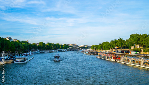Landmark view on Seine river during the sunny day in Paris.
