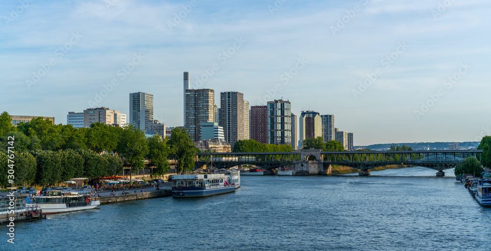 Landmark view on Seine river during the sunny day in Paris. Copy space for your text.