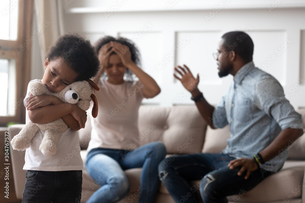 African boy feels lonely embraces toy suffers from parents scandal African boy feels lonely embraces toy suffers from parents scandal