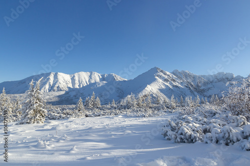 Snow covered mountains © Bogdan