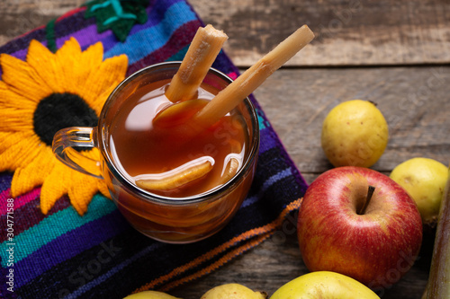 Fotografi Mexican hot  christmas punch also called ponche with fruits