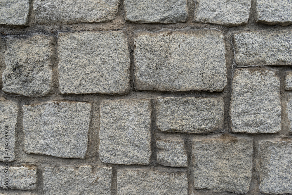 Texture of the granite stone wall for background Texture of the granite stone wall for background