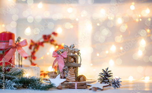 Christmas cookies with festive decoration. Homemade gingerbread. Winter decoration background. Christmas illuminations.