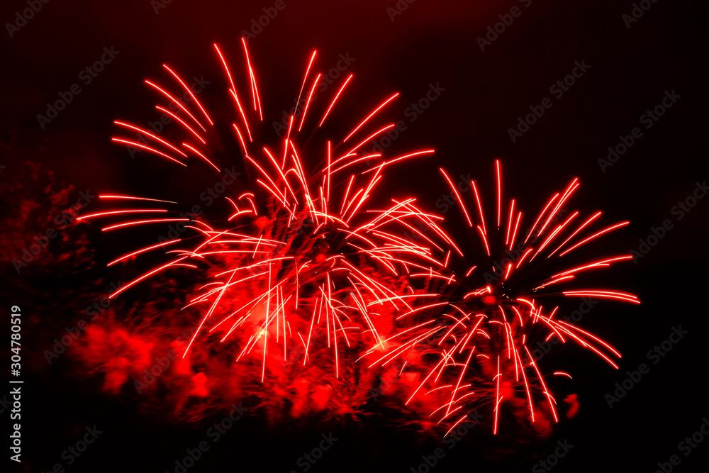 Amazing red fireworks on dark background - obrazy, fototapety, plakaty 