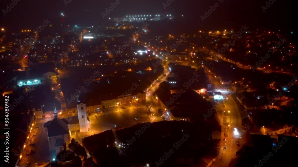 Camera flight over a small medieval town in the Holy night. Footage from Santa Claus perspective that flying at you home during Christmas. Camera flight over a small medieval town in the Holy night. Footage from Santa Claus perspective that flying at you home during Christmas.