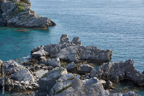 Small stone island in the sea near Sidari, Corfu, Greece