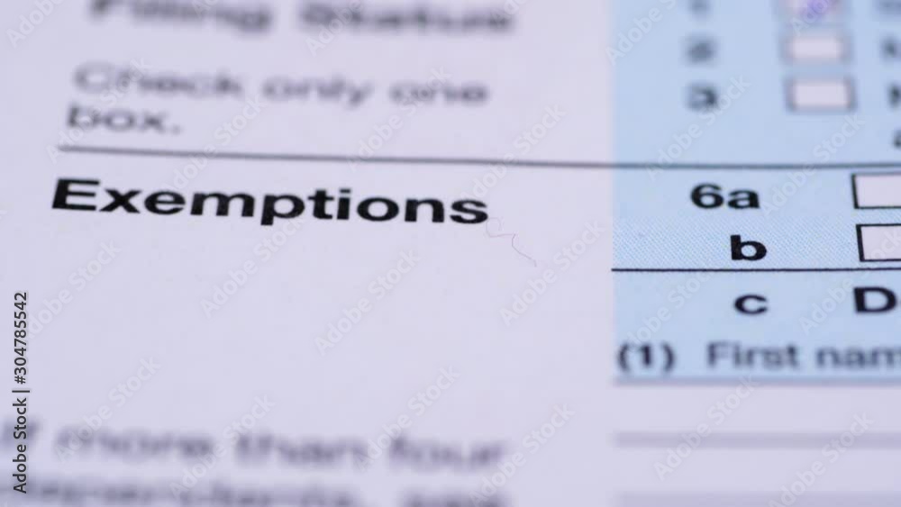 USA tax form 1040. Dolly shot. Extrem close-up view.