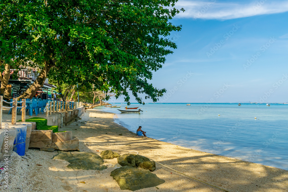 Naklejka premium The Barat Perhentian, Besur, Perhentian Islands, Malaysia; 19-May-2019; a view of the sea and beach, The Barat Perhentian, Besur, Perhentian Islands, Malaysia