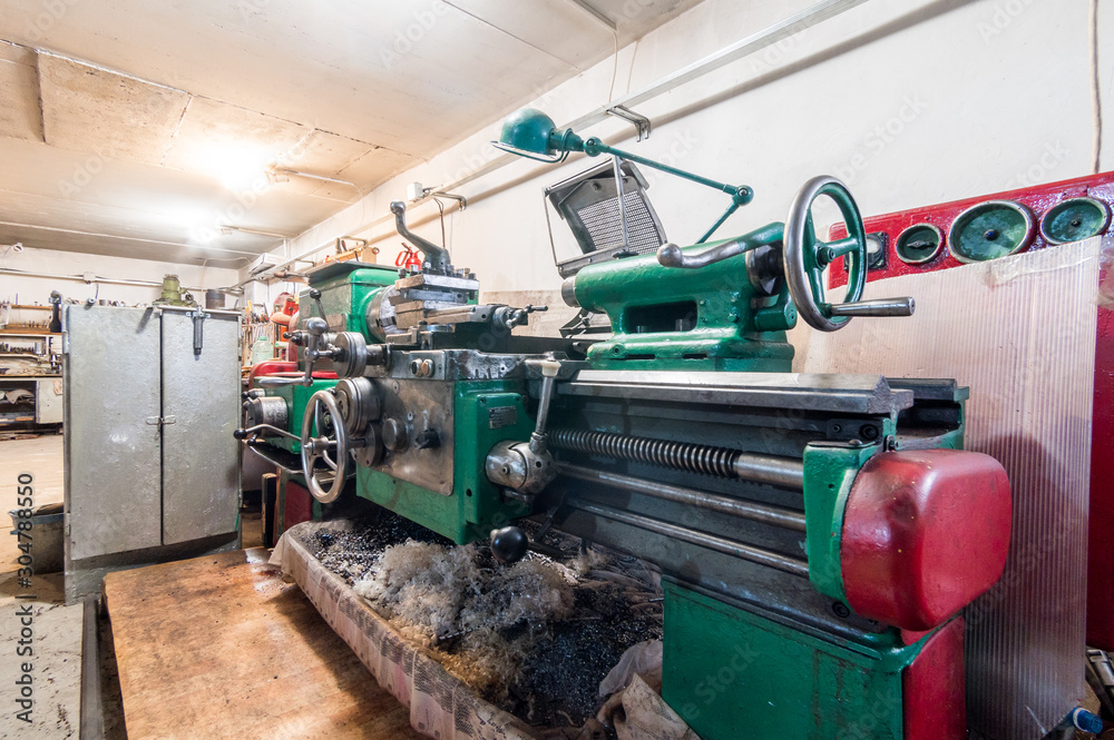 Russia, Moscow- July 06, 2019: interior machines in garage workshop. old machinery repair and production equipment. Russia, Moscow- July 06, 2019: interior machines in garage workshop. old machinery repair and production equipment.