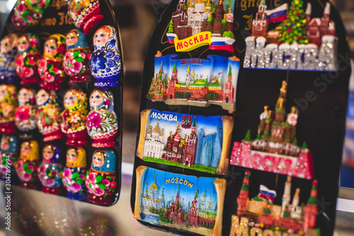 View of traditional souvenirs from Moscow  Russia  with fridge magnets with  Moscow  text  Kremlin and St. Basil Cathedral figure at local vendor souvenir shop on Red Square