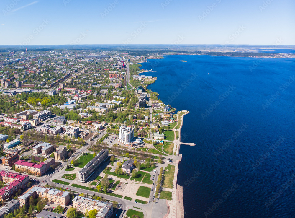 Beautiful aerial air summer vibrant view of Petrozavodsk, Russia, the administrative center of Republic of Karelia, with Onega Lake shot from drone