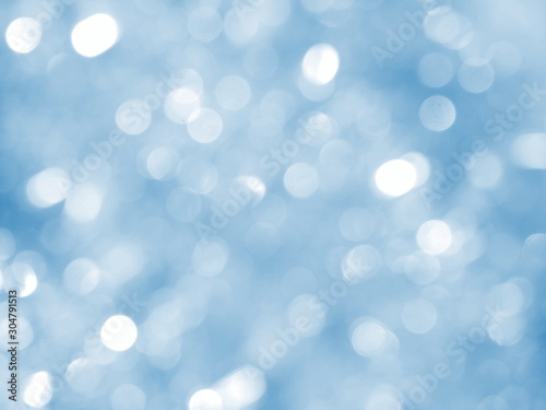 Blue background with abstract bokeh. Winter lights. 