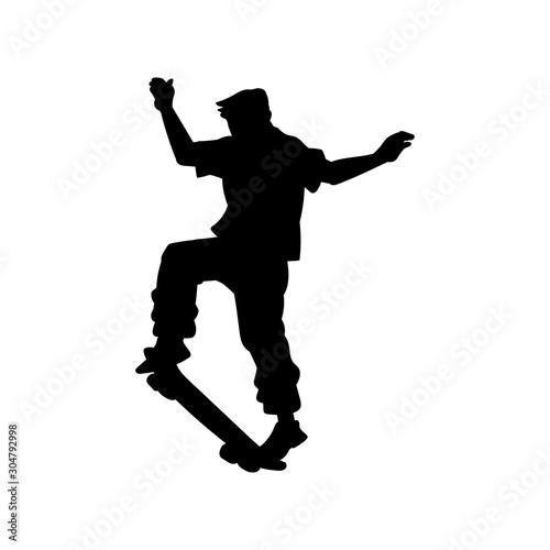 Black skateboarder teen silhouette in mid jump dynamic position