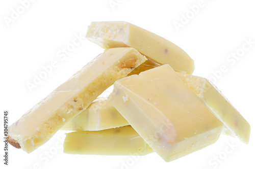 Broken white chocolate with whole almond nuts Isolated