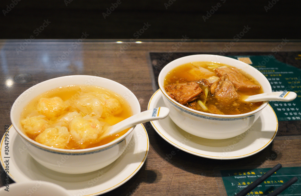 Hong Kong Beef Brisket Wonton Soup on Local Restaurant Table Hong Kong Beef Brisket Wonton Soup on Local Restaurant Table