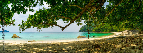 Kecil, Perhentian Islands, Malaysia; !9-May-2019; sandy beach and salty sea, D'lagoon Beach, Kecil, Perhentian Islands, Malaysia photo