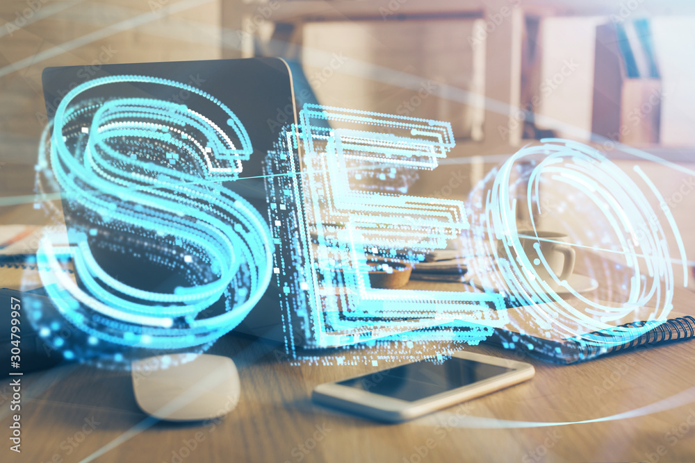 Multi exposure of table with computer and seo drawing hologram. Search optimization concept. Multi exposure of table with computer and seo drawing hologram. Search optimization concept.