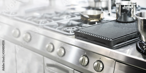 Foto Wide culinary industry banner - part of a modern kitchen in the restaurant or ho