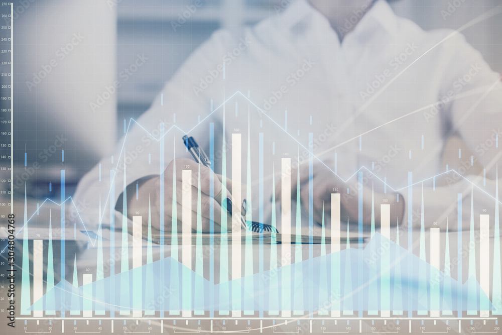 Financial chart drawn over hands taking notes background. Concept of research. Multi exposure Financial chart drawn over hands taking notes background. Concept of research. Multi exposure