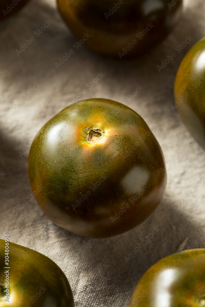 Raw Brown Organic Kumato Tomatoes Raw Brown Organic Kumato Tomatoes