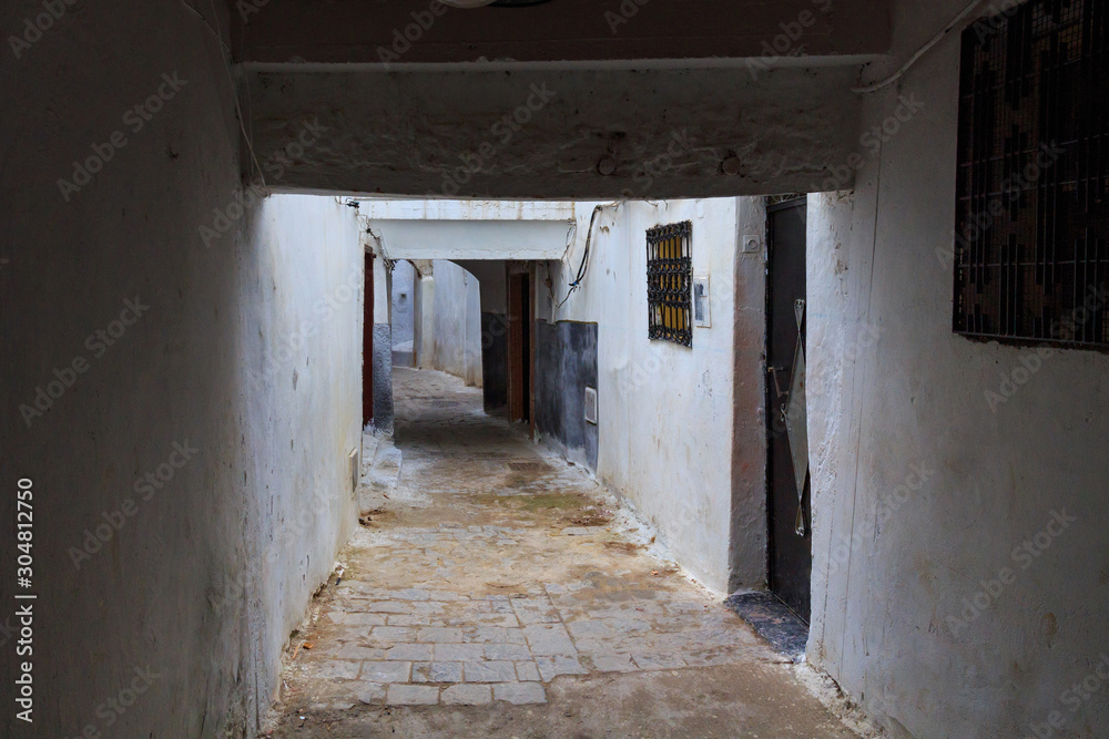 View of the one of the typical old narrow streets of Tetouan (Northern Morocco) in historical center of the city.