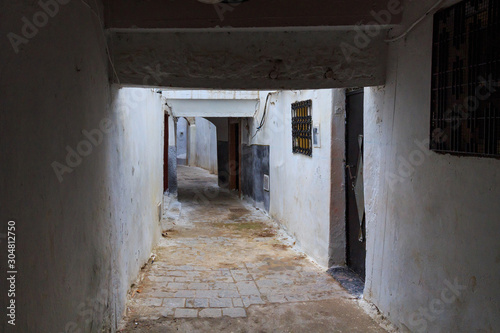 View of the one of the typical old narrow streets of Tetouan (Northern Morocco) in historical center of the city.